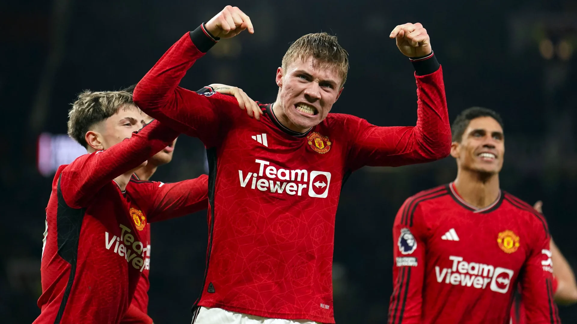 Manchester United players celebrate victory