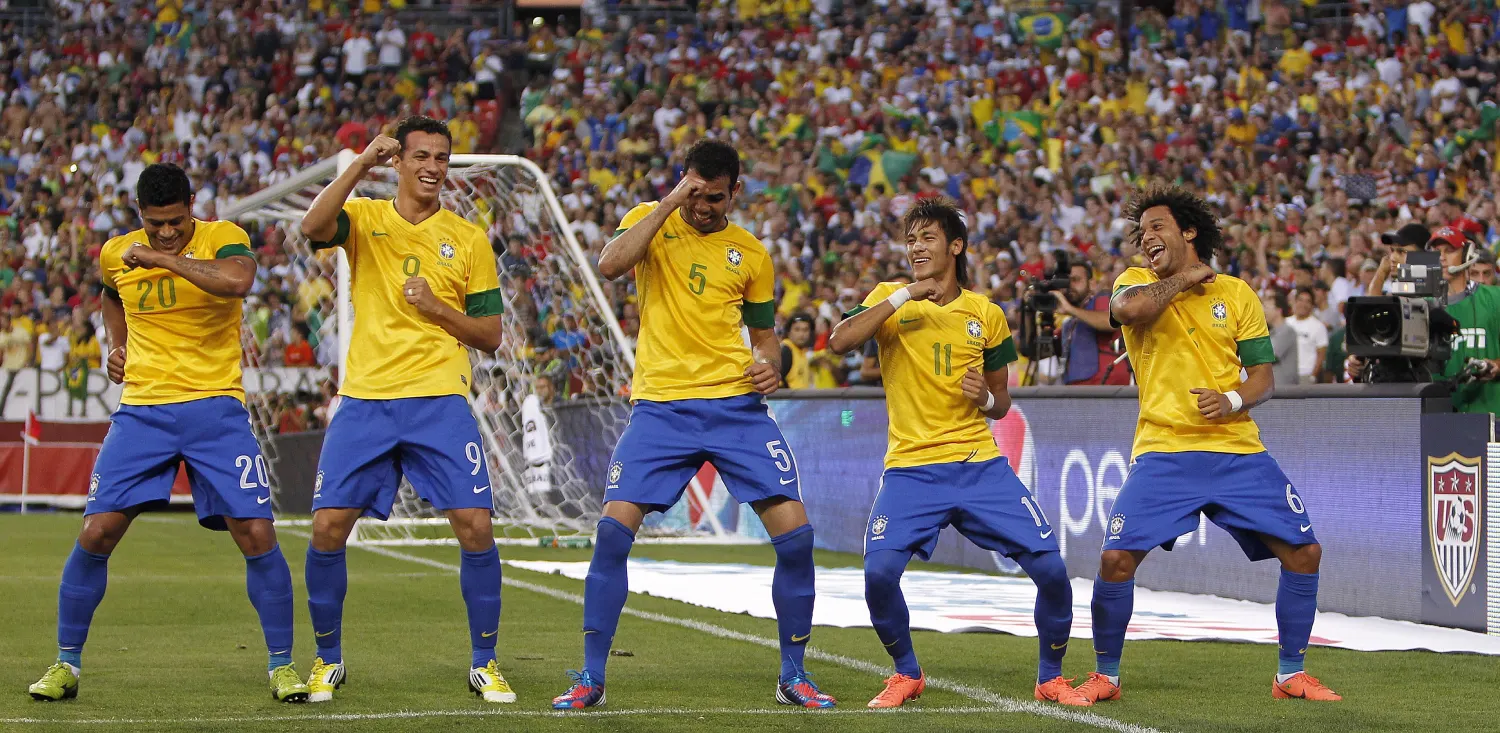 Brazil team dancing in ground