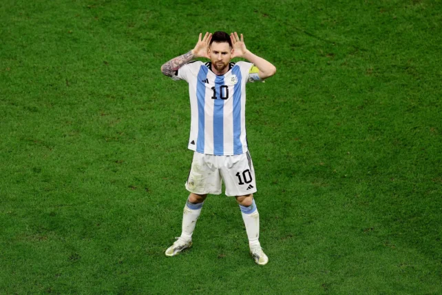 Messi both hands on his face